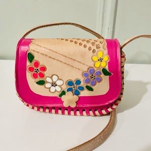 Mexican handcrafted leather purse for girls.